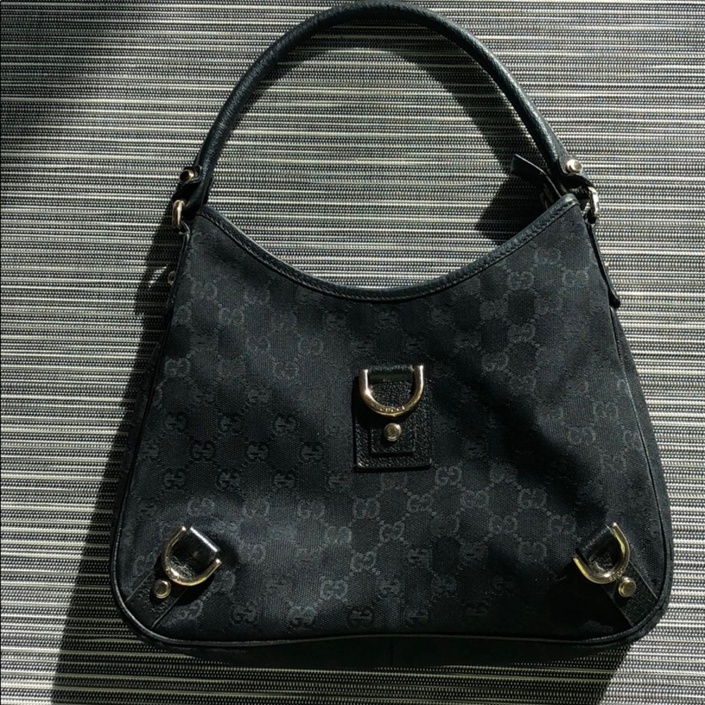 Authentic Gucci black "GG" canvas Abbey handbag